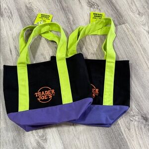 Trader Joe's Black and Purple Tote Bag with Green Handles